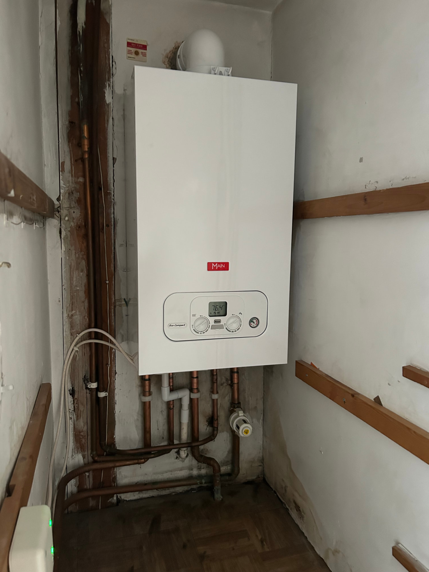 Newly installed Main combi boiler with fresh copper pipework in a Liverpool home
