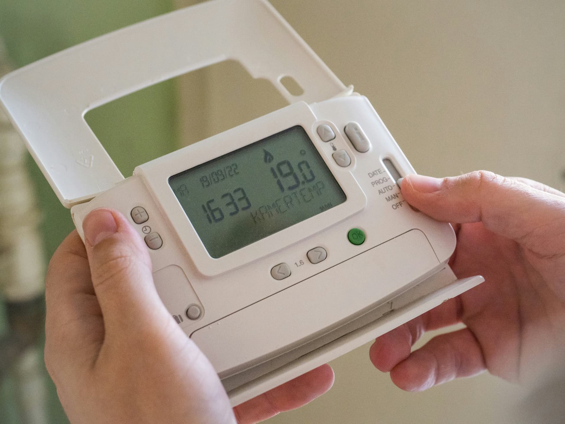 Heating programmer being set after a boiler installation in Liverpool