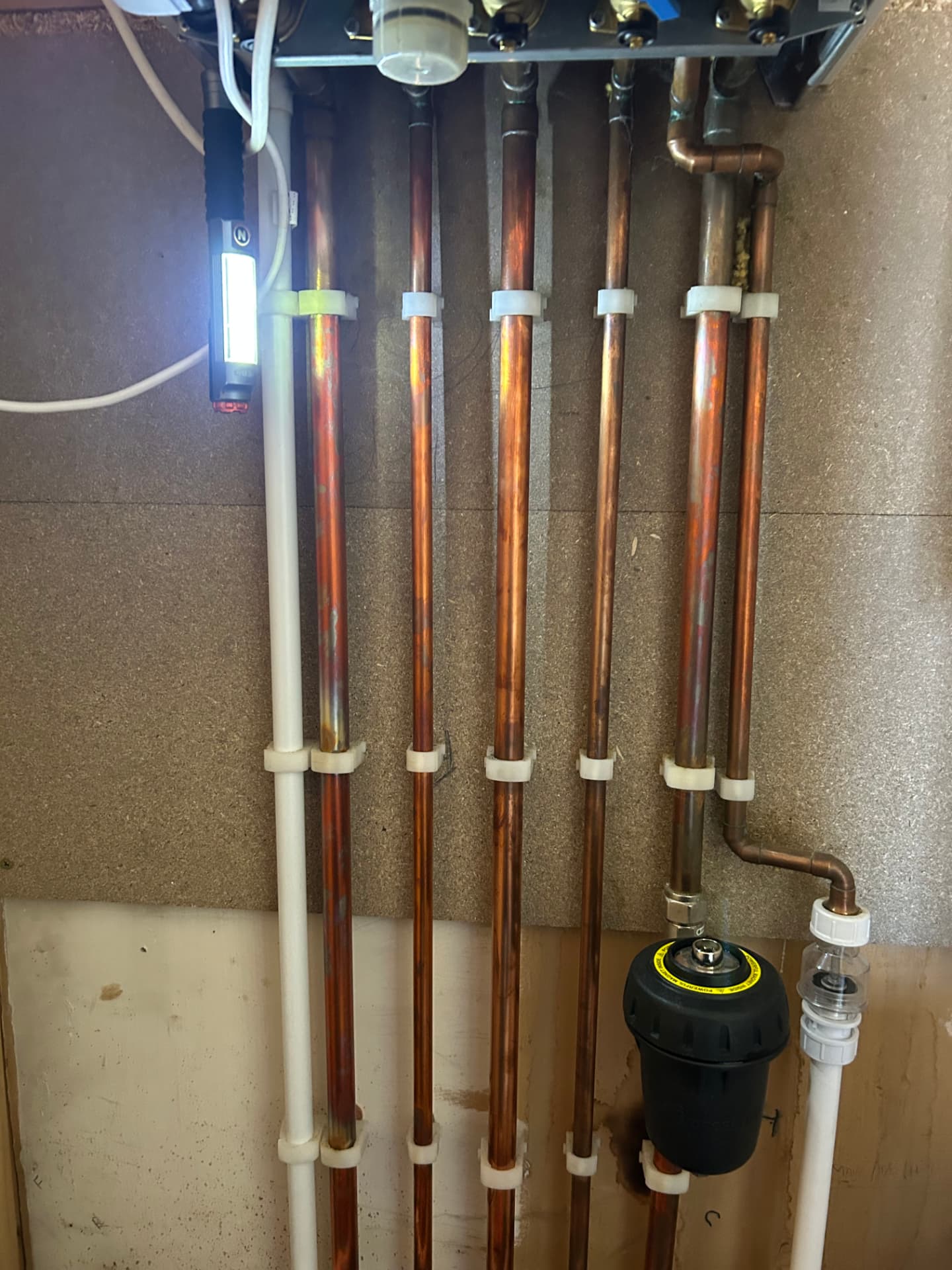 Central heating pipework with a magnetic system filter fitted in Liverpool