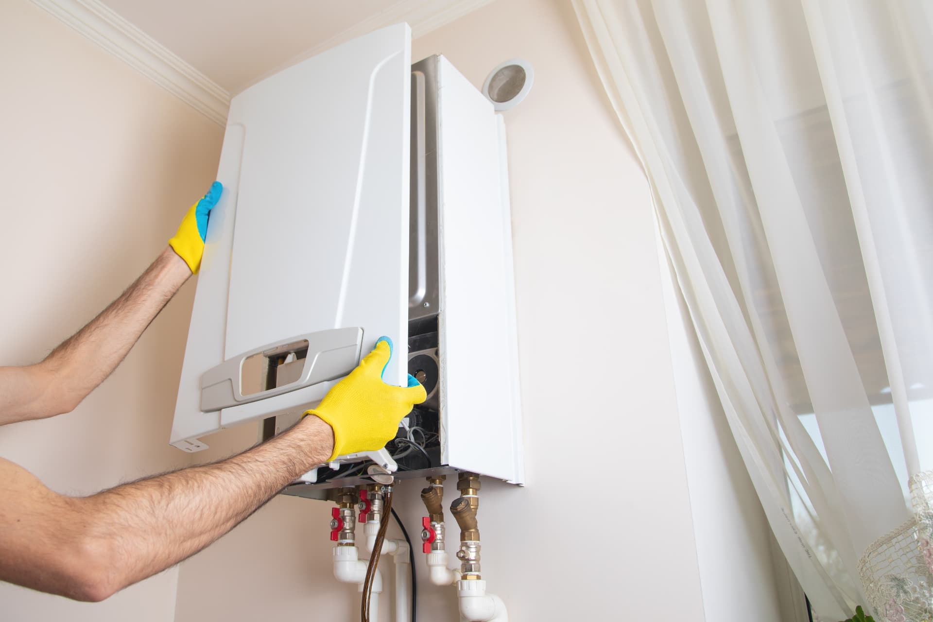 Old boiler swapped for a new combi boiler in a Liverpool home