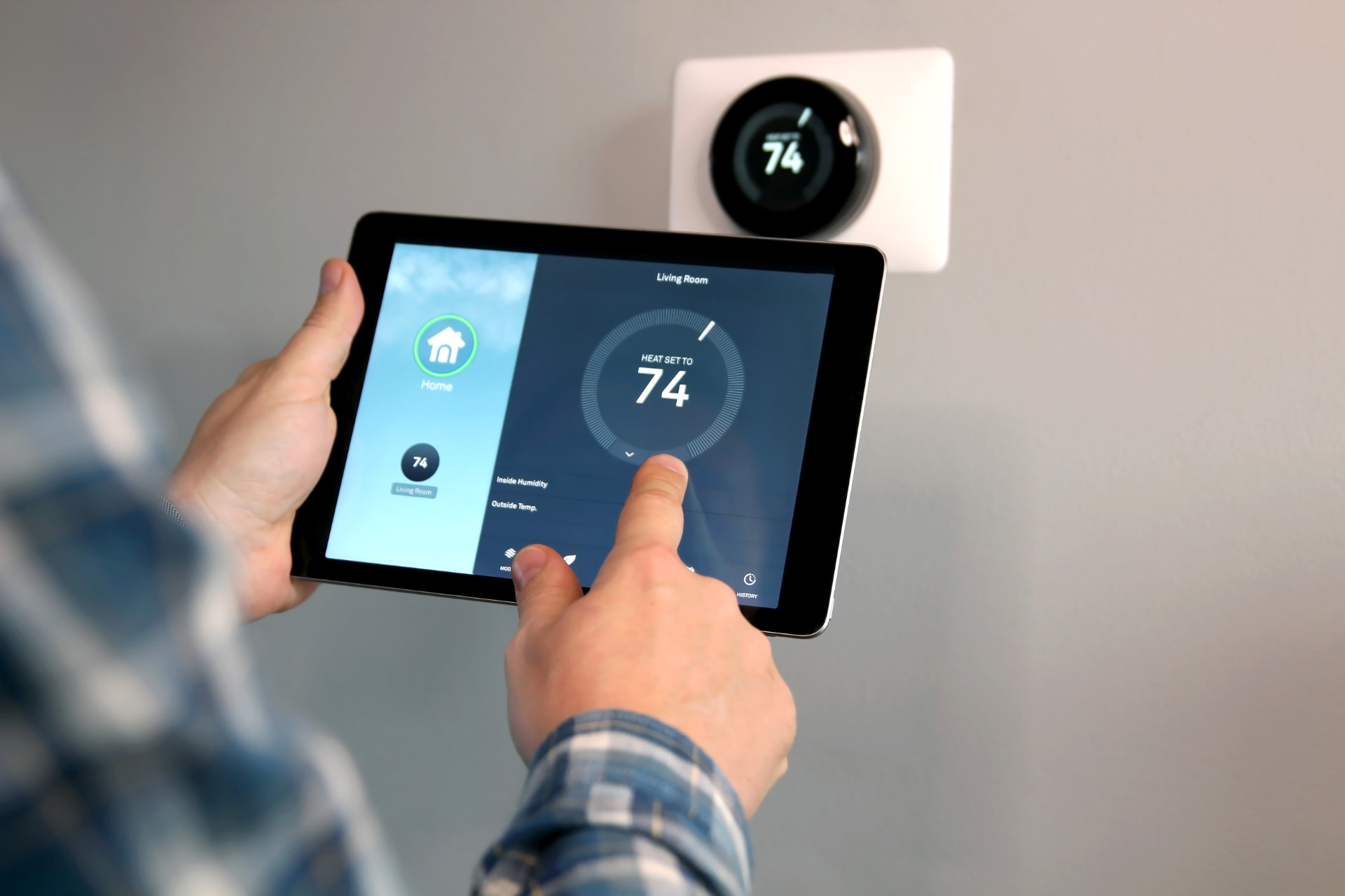 Smart heating controls being set from a tablet after a heating upgrade in Liverpool